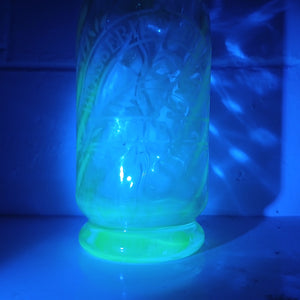 French antique uranium glass bottle glowing green at French Originals NZ